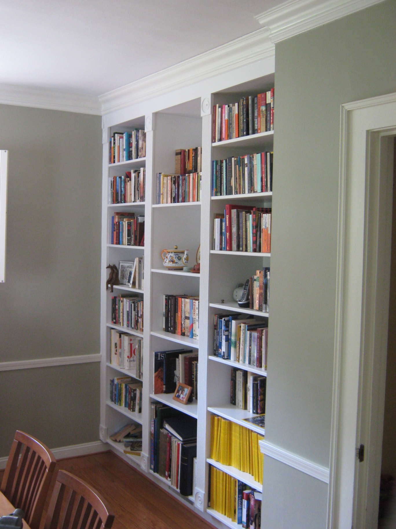 Custom built-in bookshelves with crown molding