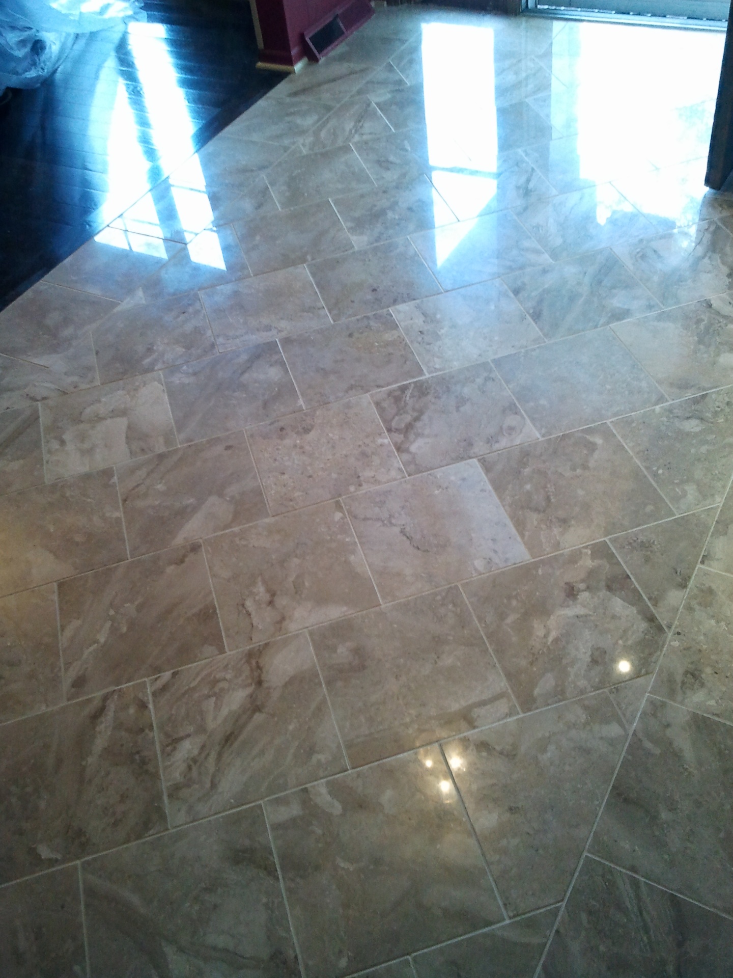 Polished marble tile floor in Ballwin